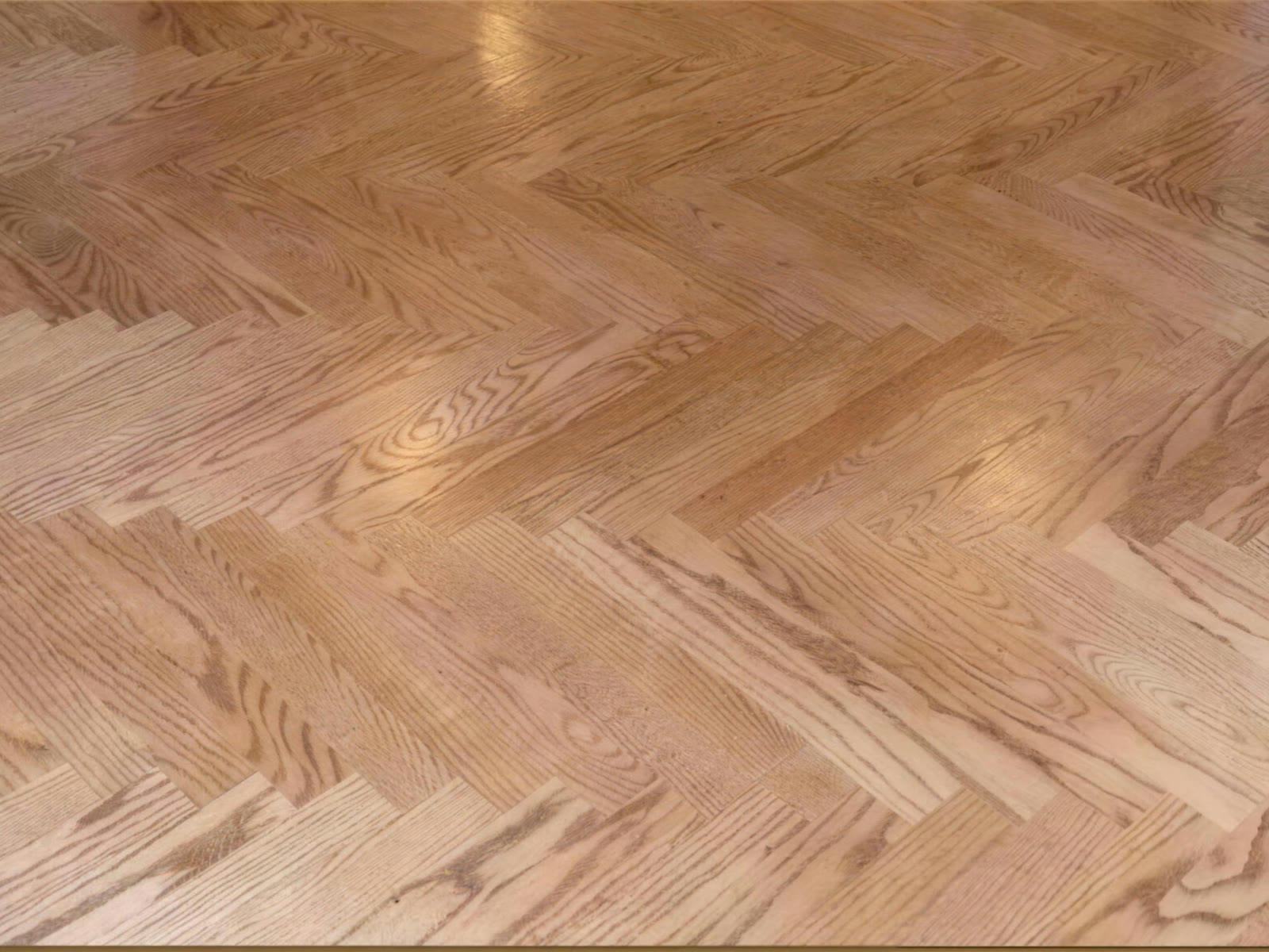 Oak herringbone floor hand-set and finished by Floors by Jimmy Connors